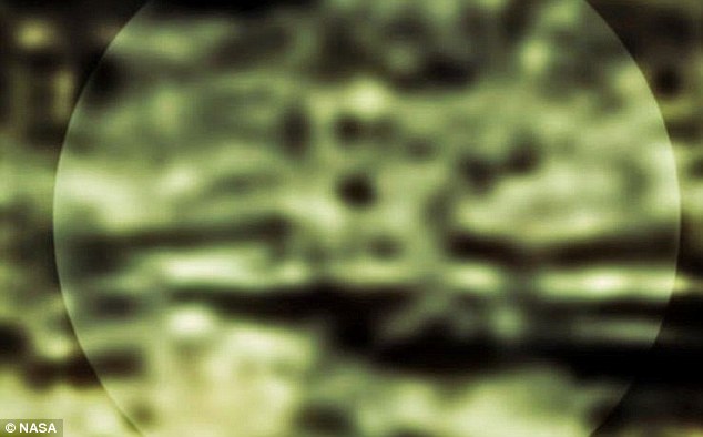 Andre Gignac, a prolific UFO hunter, believes this shadowy image appears to be a 'female robot' with 'breasts'