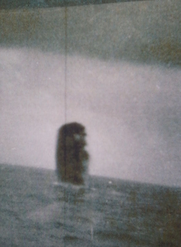As you can see from the UFO going into the sea it appears to be a solid object