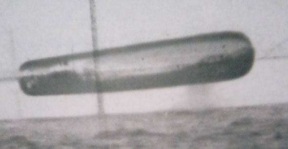 Another large cylinder shaped UFO