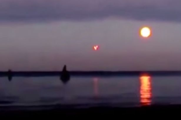 Large red Orbs seen off the coast of Russian recently.
