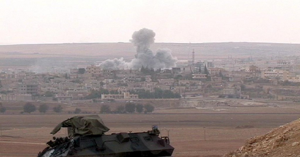 Turkish military watching on during the battle of Kobani