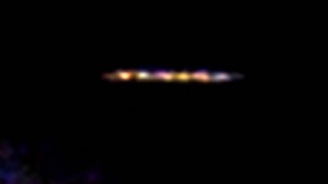 A close-up of the brightly lit Cigar-shaped UFO Picture: Astro-photographers: Paul and Sylvia Mayo.